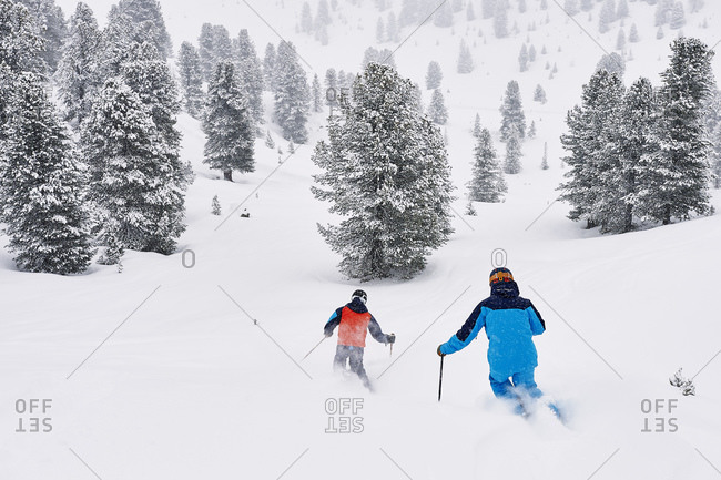 Skiers skiing, Kuhtai, Austria - Offset