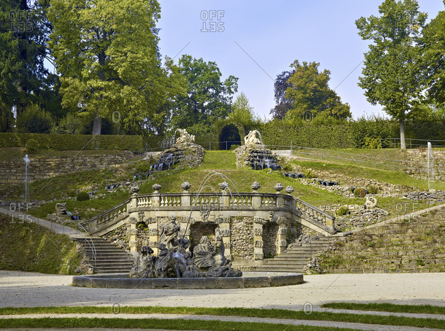 September 10, 2016: Cascade and Neptune fountain at Castle Park Fantaisie, Eckersdorf, Upper Franconia, Bavaria, Germany