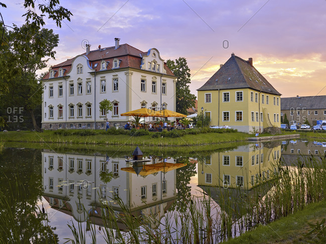 August 19, 2016: Kahnsdorf Castle with Schiller Cafe in Kahnsdorf on Lake Hainer near Leipzig, Saxony, Germany