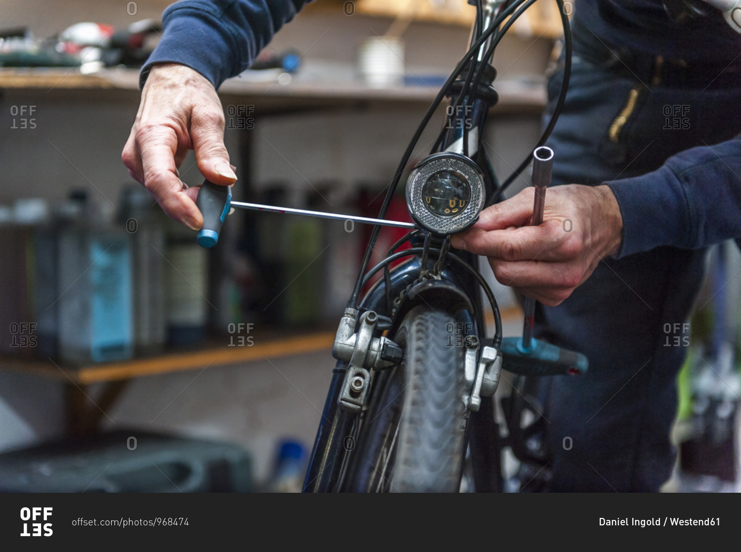 Bicycle mechanic working in bike shop