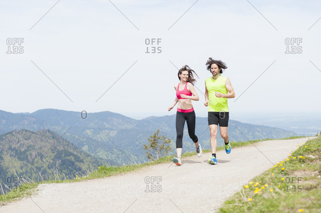 Couple jogging together- Wallberg- Bavaria- Germany