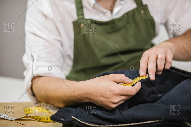 Equipment For Designing Clothes, Measuring Tape, Wooden Scale And Scissors  On Black Fabric Stock Photo, Picture and Royalty Free Image. Image 53653392.