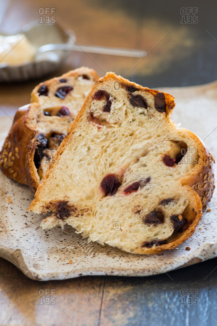 Sweet challah bread with chocolate and cranberries, sliced, closeup