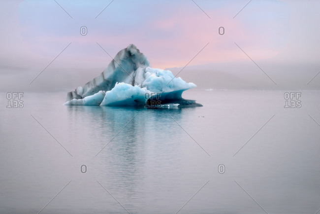 Blue iceberg floating in Jokulsarlon Lagoon, Southern Iceland