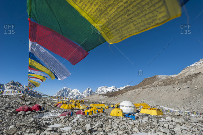 Everest Base Camp, Namche, Khumbu, Everest Region, Nepal - April 13, 2009: Prayer flags adorn climbers tents at Everest base camp in Nepal