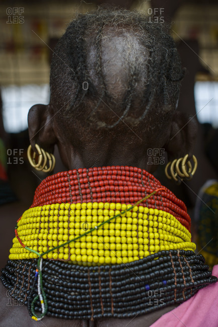 Turkana women's typical necklaces, earrings and hairstyle, Kenya