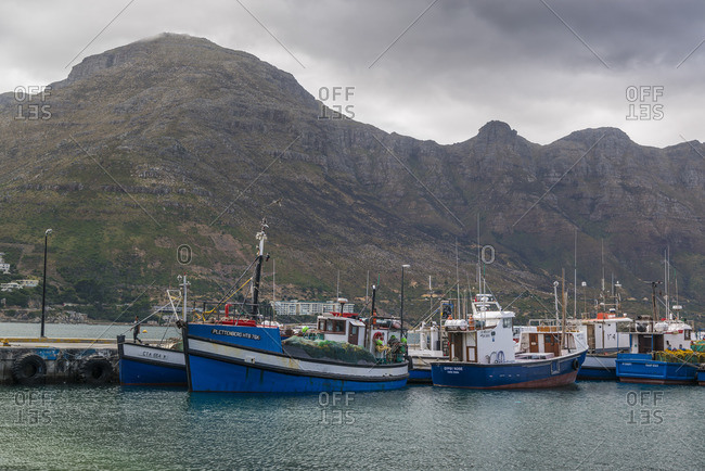 March 5, 2017: Fishing boats in the harbor of Kalk Bay, False Bay, South Africa