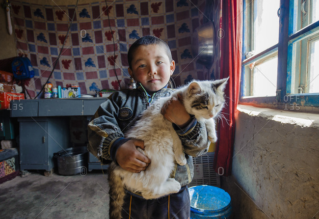 May 17, 2010: Kids in remote xinjiang have very few possessions and pets are their main source of entertainment.