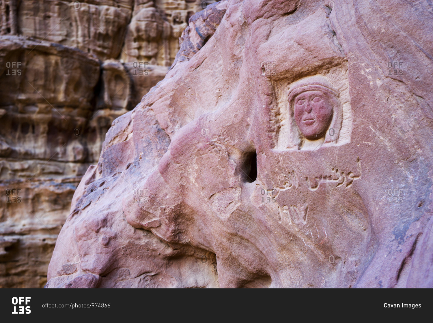 A prehistoric carving and engraving on a rock face in Wadi Rum desert