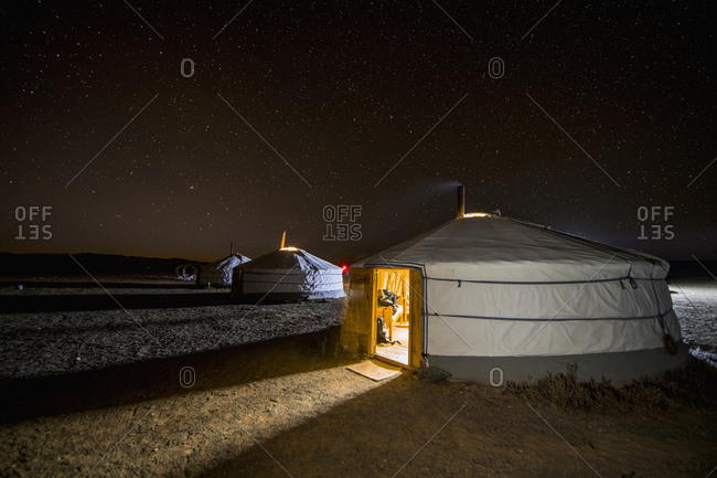 Illuminated yurts at night, Khongor, Mongolia