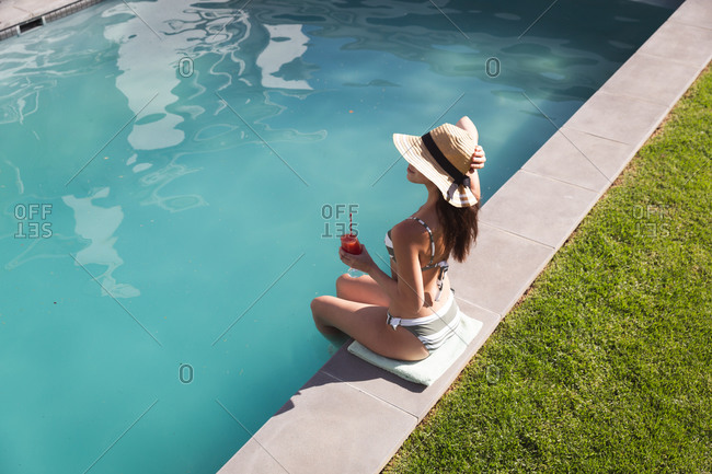 sitting in the pool stock photos - OFFSET