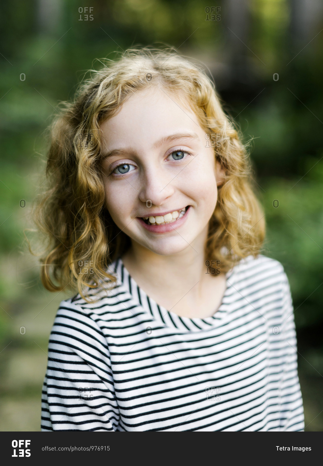 Portrait of smiling girl (12-13) stock photo - OFFSET