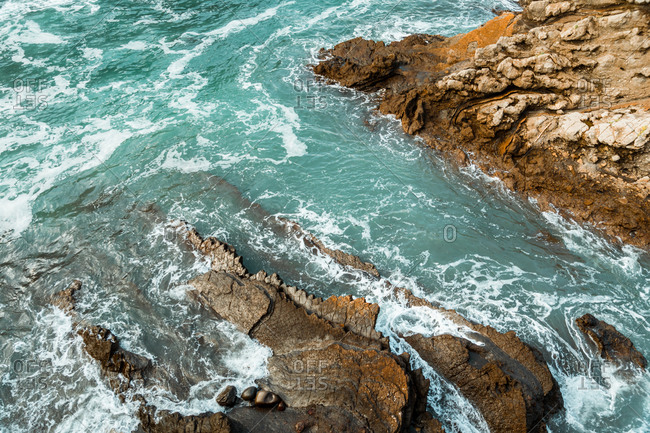 Turquoise Sea From Above With Rocks stock photos - OFFSET