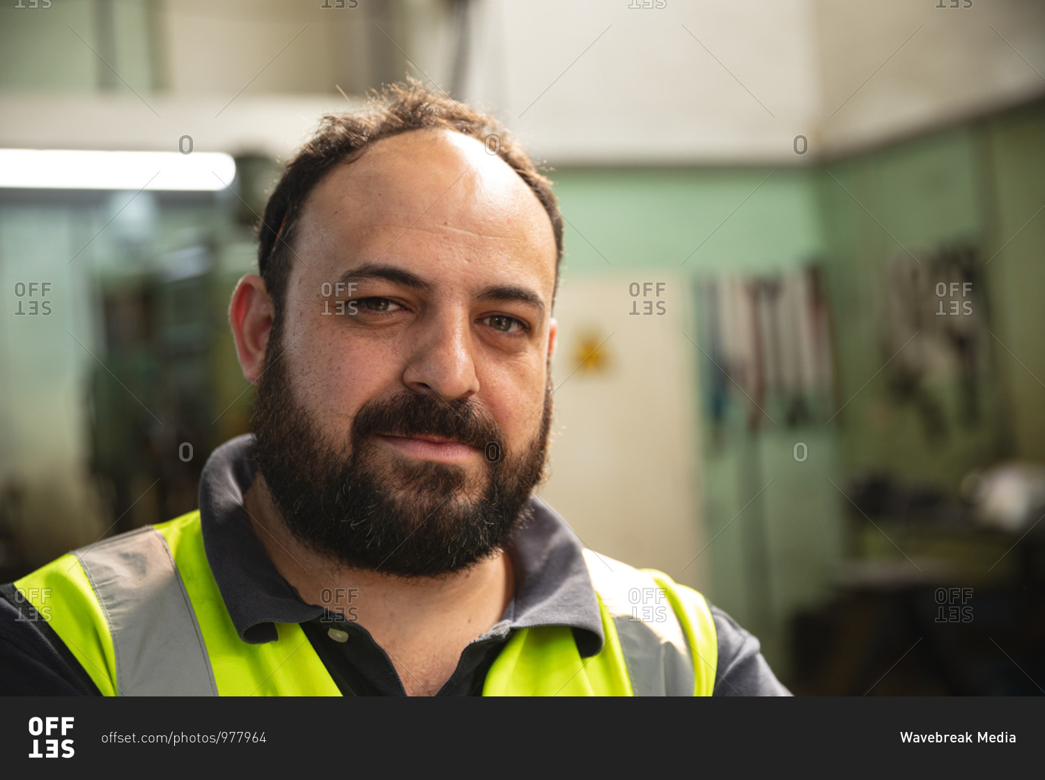Portrait of a male factory worker wearing a Hi-vis vest