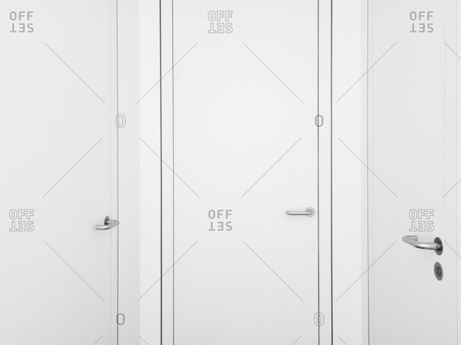 Minimalist white doors in apartment