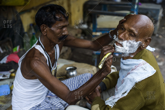 March 1, 2014: Barbers on the streets of Varanasi, India