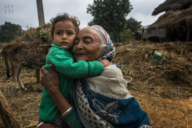 February 10, 2014: Grandmother and granddaughter in a Nepalese village, West Terai, Nepal