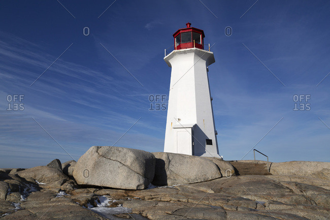 Peggy's Point Lighthouse on a winter day at Peggys Cove, one of the points on the Lighthouse Route, Nova Scotia, Canada, North America