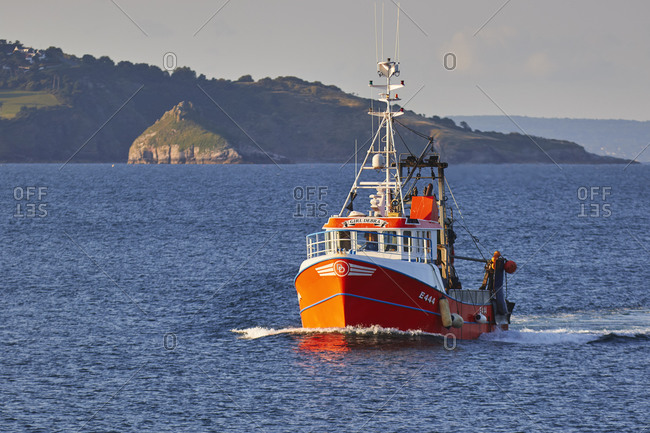 August 15, 2017: A fishing boat returns to port after a hard day at sea, Brixham, the southwest's busiest fishing harbour, Devon, England, United Kingdom, Europe