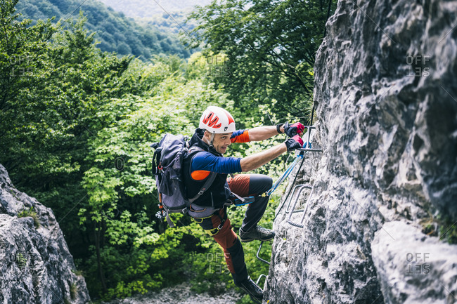 Mountaineer climbing on via ferrata- Orobie- European Alps- Como- Italy