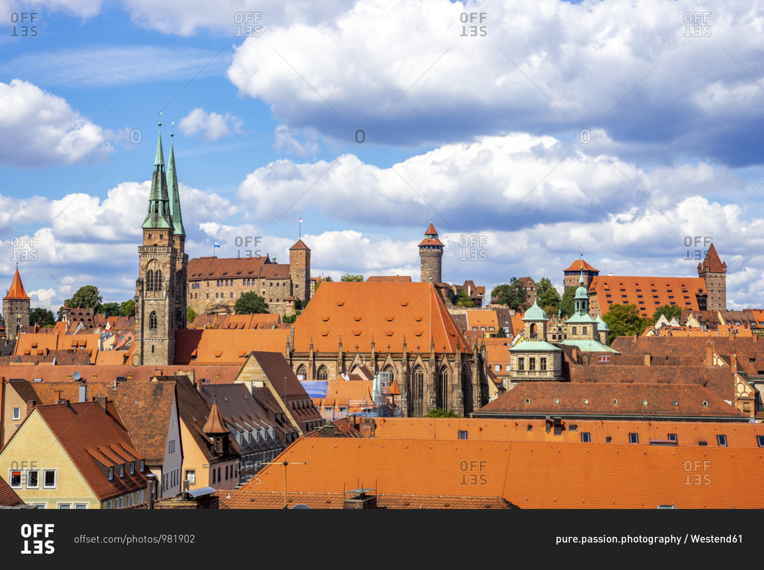Germany- Bavaria- Nuremberg- Clouds over old town buildings surrounding Nuremberg Castle