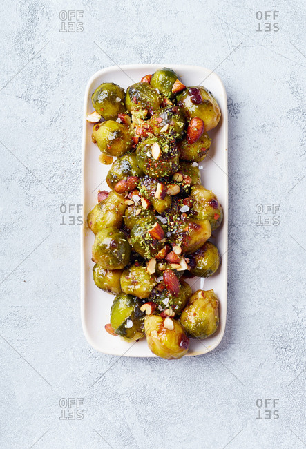 Roasted brussels sprouts with almonds and lime and honey dressing
