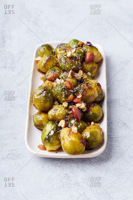 Roasted brussels sprouts with almonds and lime and honey dressing