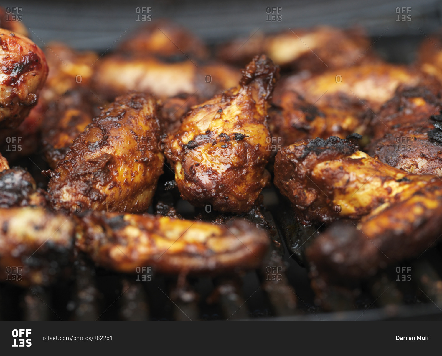 Chicken wings on grill outside