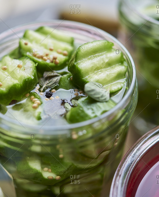 Homemade pickled cucumbers in a glass jar
