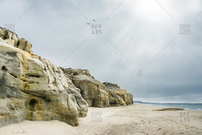 Europe, Portugal, Estremadura, Centro region, Praia d'El Rey, rugged rocky coast