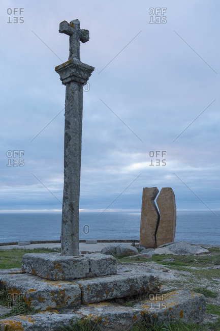 October 11, 2019: Spain, Galicia, Costa da Morte, Muxia, Jacobsweg, place of pilgrimage, Mirador Jesus Quintanal, monument, cross, weathered