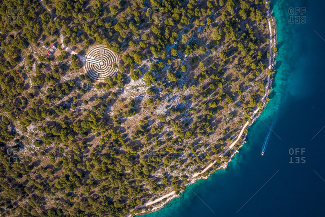 Aerial view of shoreline surrounded by turquoise water in Rogoznica, Croatia