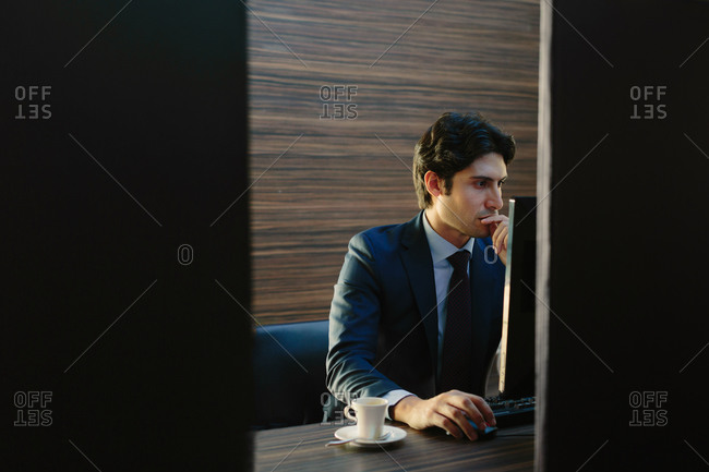 Businessman working in business center in hotel