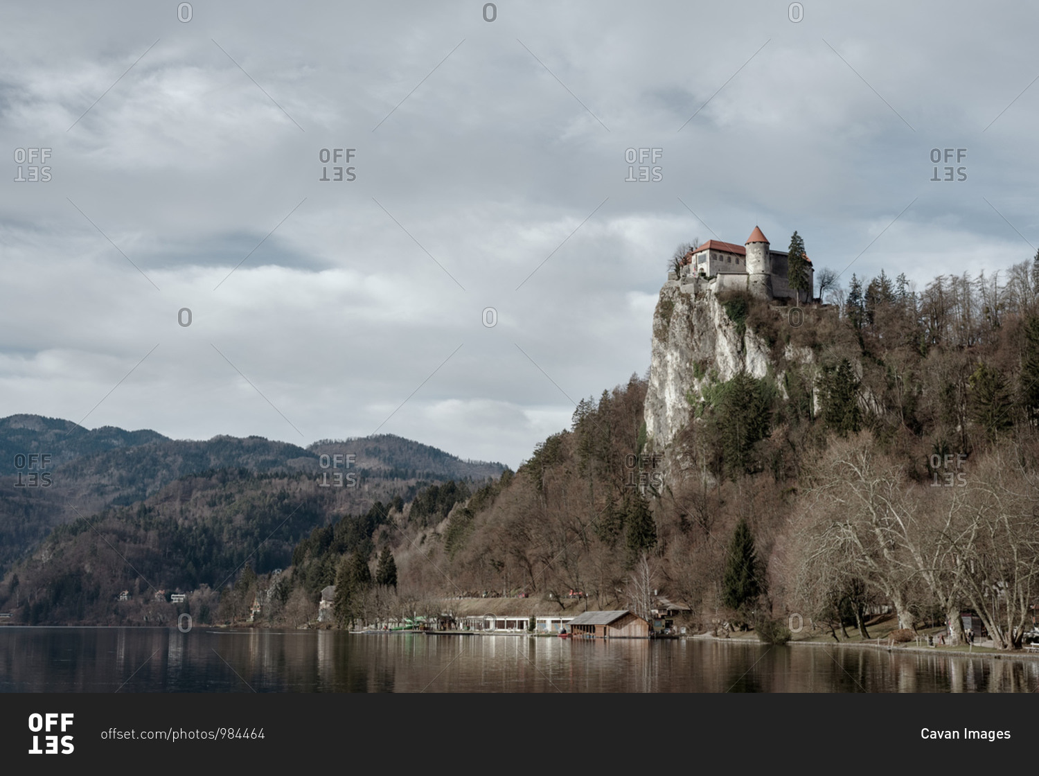 Bled castle on top of steep cliff above lake Bled in Slovenia