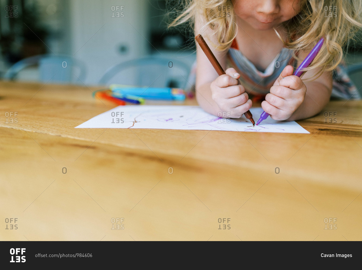 Little toddler girl drawing at home