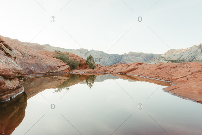 Line of reflection from rare pool of water in utah desert after rain