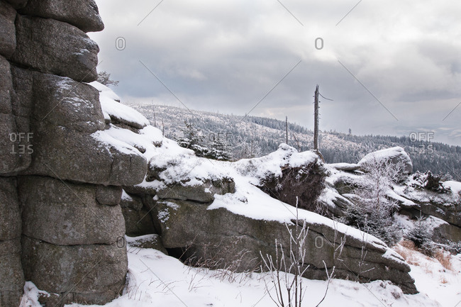 Rock formations in winter on the Dreisesselberg in the border triangle Germany / Austria / Czech Republic