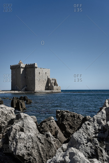 The fortified Monastary of Abbey on the island of Saint-Honorat. Along the coast of the mediterranean sea and the d\'Azur in France. Just in front of the city of Cannes.
