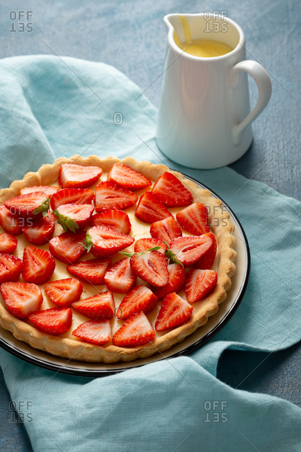 Close up of strawberry pie with custard