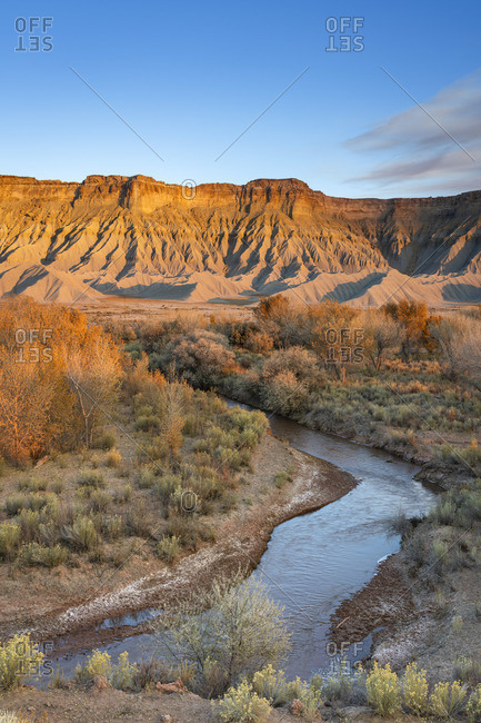 Fremont River and badlands at South Caineville Mesa, Caineville, Utah, Western United States, USA