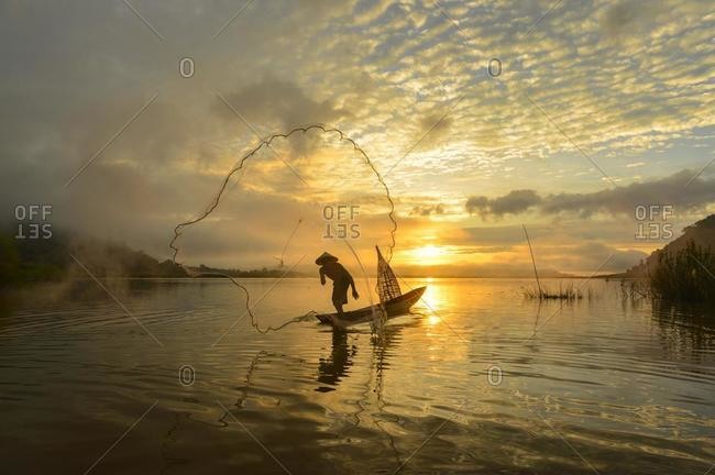 mekong river fishing stock photos - OFFSET