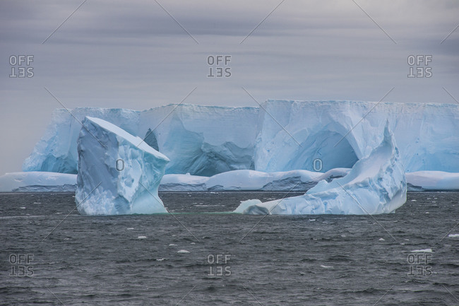 Iceberg floating near shore of Elephant Island