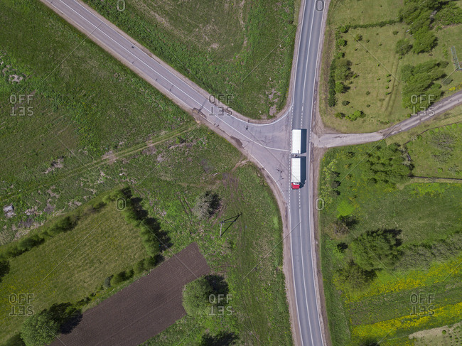 Russia- Moscow Oblast- Aerial view of truck driving past intersection on country road