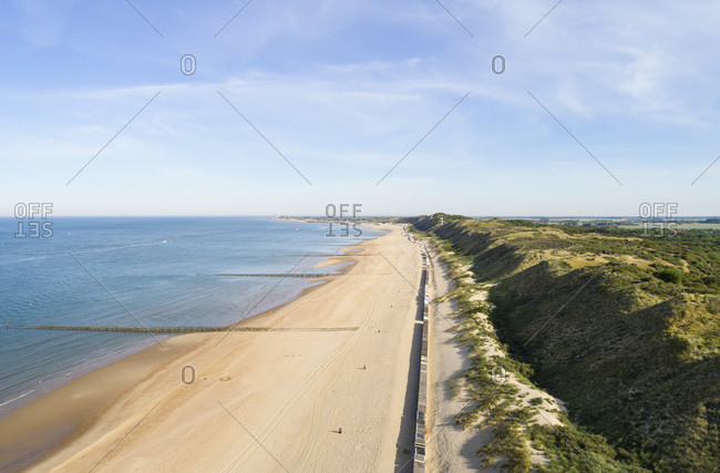 View along dunes and sandy beach between Zoutelande and Vlissingen, The Netherlands.