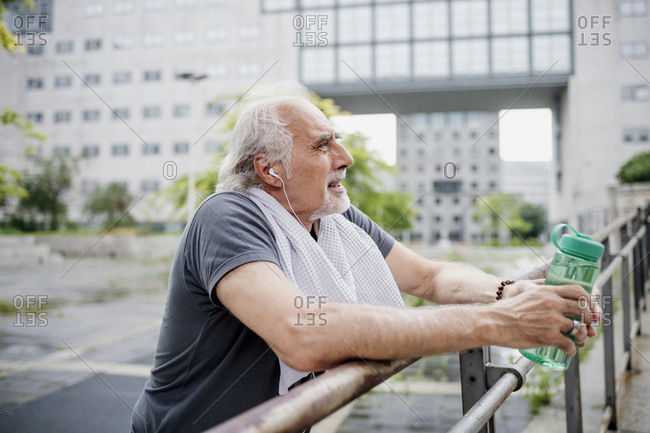 Portrait Of Senior Man Holding Bottle Of Water. Stock Photo, Picture and  Royalty Free Image. Image 46730788.