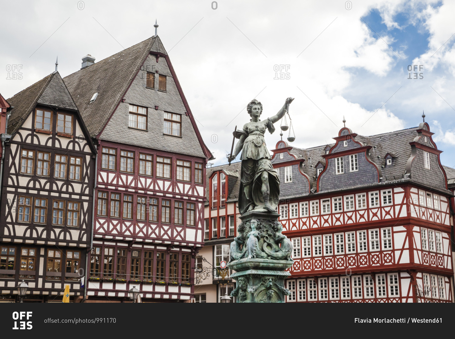 Germany- Frankfurt- Old buildings and statue on Romerberg square
