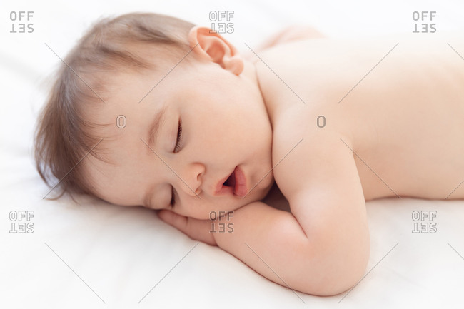High angle view of sleeping baby's face