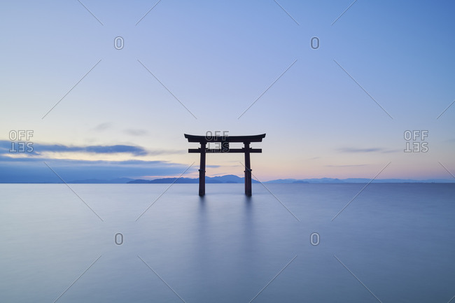 Long exposure shot of Shirahige shrine Torii gate at sunrise, Lake Biwa, Shiga Prefecture, Japan