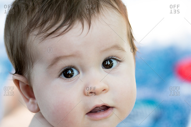 Beautiful look of a one-year-old child with a selective focus