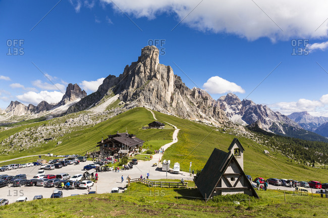 Alpine chalet Passo Giau and little chapel in front of Mount Gusela (2595m) part of Nuvolau mountain (2574m), Giau Pass, Dolomites, Alps, Province of Belluno, Veneto, Italy